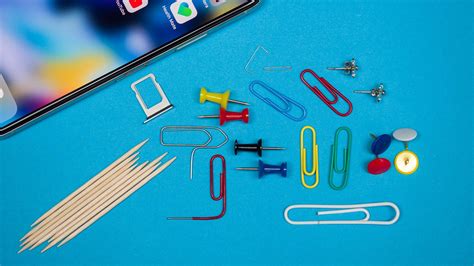 How to open a SIM card tray when an ejector tool isn't around .